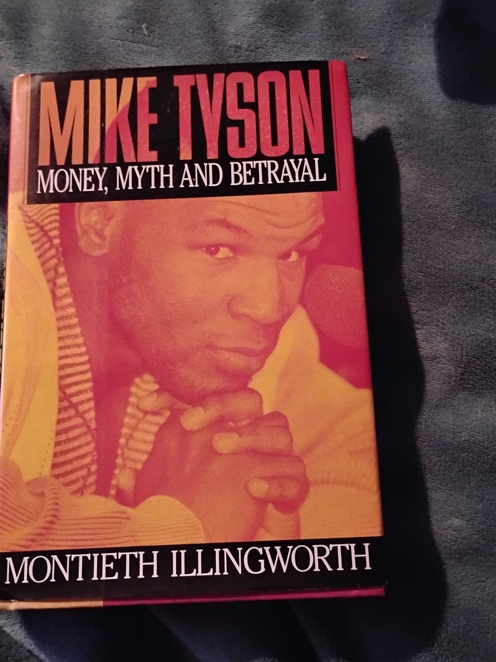 Mike Tyson: Money, Myth and Betrayal by Montieth Illingworth - Red/Orange Cover